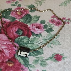 Elegant Gold and Black Pendant Necklace